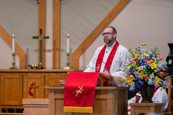 The Rev. Jesse Baker preaches at First United Methodist Church of Elon, N.C. A poet as well as a pastor, Baker writes a sonnet based on the Scripture he intends to preach on each week, then uses the sonnet to inspire his sermon. His new book, “Clarity and Light: Meditations on Scripture,” is a collection of his sonnets. Photo by Patrick Abbott, courtesy of First United Methodist Church. The Rev. Jesse Baker preaches at First United Methodist Church of Elon, N.C. A poet as well as a pastor, Baker writes a sonnet based on the Scripture he intends to preach on each week, then uses the sonnet to inspire his sermon. His new book, “Clarity and Light: Meditations on Scripture,” is a collection of his sonnets. Photo by Patrick Abbott, courtesy of First United Methodist Church.