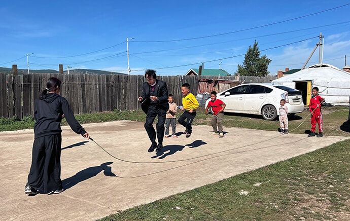 On Aug. 31, Bishop Jeremiah J. Park jumps rope with children at Ezenii Urgoo United Methodist Church near Ulaanbaatar, Mongolia, during his visit to preach, encourage and bless the congregation. Photo by the Rev. Thomas E. Kim, UM News.