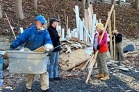 Members of Floris United Methodist Church help Barbara Douglas remove debris from her home in Spruce Pine, N.C., following Hurricane Helene. Video image by Lilla Marigza, UM News. Members of Floris United Methodist Church help Barbara Douglas remove debris from her home in Spruce Pine, N.C., following Hurricane Helene. Video image by Lilla Marigza, UM News.