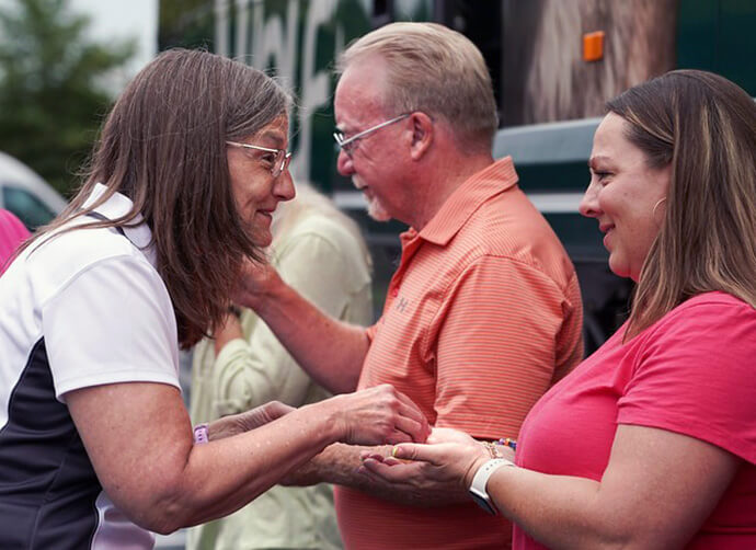 Western Pennsylvania Conference Bishop Sandra Steiner Ball serves communion to members of four northeastern annual conferences who toured 14 civil rights history sites together in July. Photo by Jeannie Schott, Western Pennsylvania Conference.