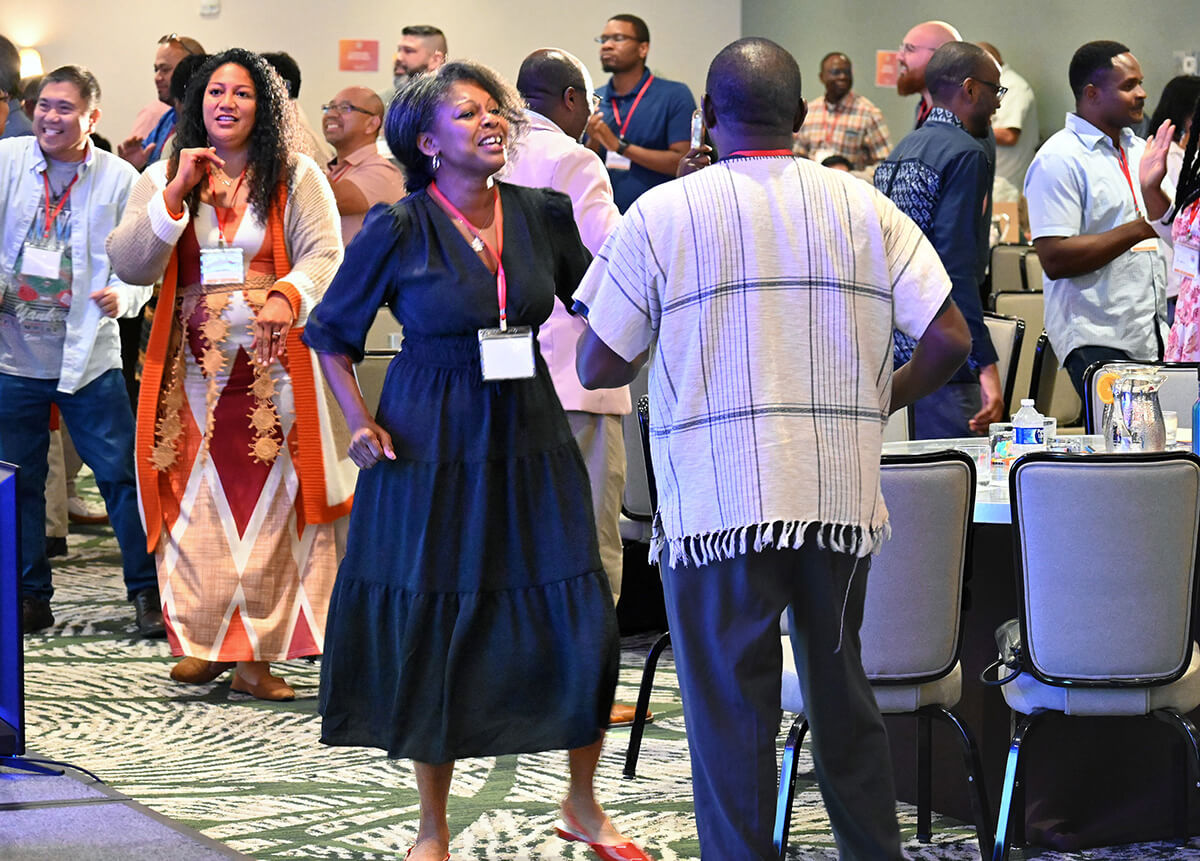 Participants at the Facing the Future 2025 conference take a dance break Oct. 7 at Sonesta Los Angeles Airport hotel in Los Angeles. The national conference examined the challenges of cross-cultural and cross-racial clergy. Photo by Jim Patterson, UM News.
