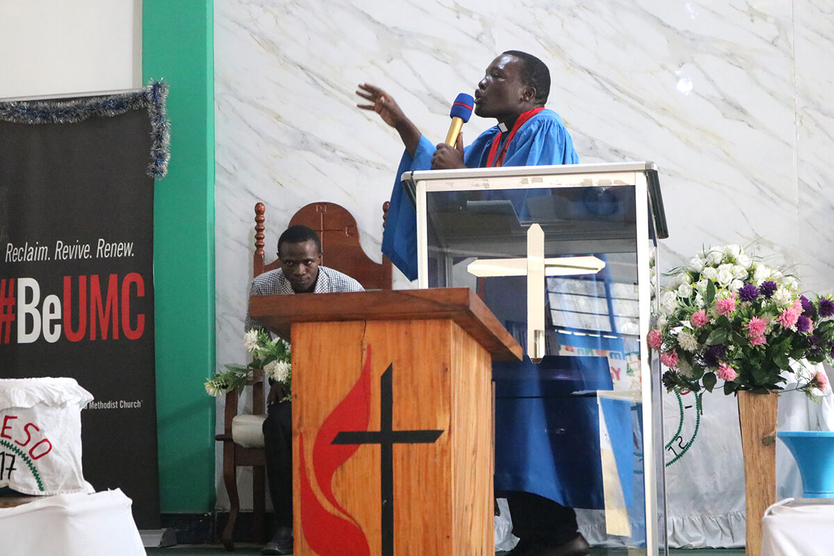 The Rev. Isaac Ibrahim, Dar es Salaam District superintendent, preaches during worship Nov. 9 in Tanzania. The United Methodist Church in the region has stepped up efforts to promote prayer, peace education and reconciliation following post-election violence in October. “No development is possible without peace,” Ibrahim said. Photo by Asaph Sungura Ally, UM News.