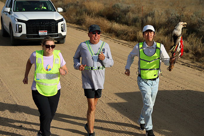 Bishop Kristin Stoneking of the Mountain Sky Conference, Bishop David Wilson of the Great Plains Conference and the Rev. Bun Koo Lee, a district superintendent in the Mountain Sky Conference, run a leg of the Sand Creek Massacre Spiritual Healing Run on Oct. 27 outside Eads, Colo. Photo by Todd Seifert, Great Plains Conference.