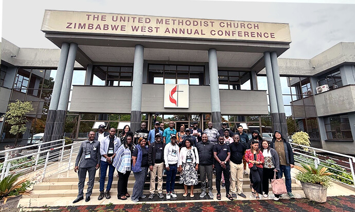 United Methodist Broadcast Network members pose at the Zimbabwe West Conference head office in Harare at the close of the network’s 10th anniversary celebrations and general assembly. The broadcasters celebrated a decade of amplifying the message of The United Methodist Church and the growth of the network from the founding four members to 17. Photo by Floreuce Dale Cancio, Baguio Episcopal Area.
