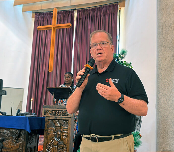 The Rev. Rick Vance, top executive of United Methodist Men, speaks during the inaugural meeting of the men’s group on the African continent Dec. 9-11 at Africa University in Mutare, Zimbabwe. “Ministry with and for men is happening in vibrant ways in Africa and there is a deep desire about discipleship,” he said. Photo by Eveline Chikwanah, UM News.