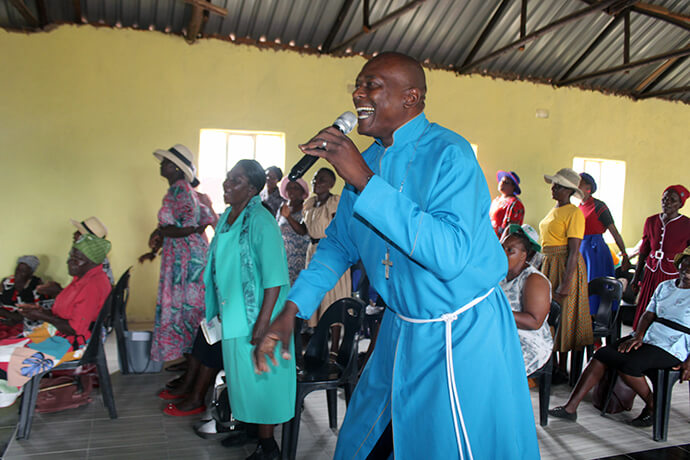Pastor Zondai Chifamba preaches about the prodigal son during services inside the new United Methodist sanctuary he helped to build in Birchenough, Zimbabwe. Photo by Kudzai Chingwe, UM News. 