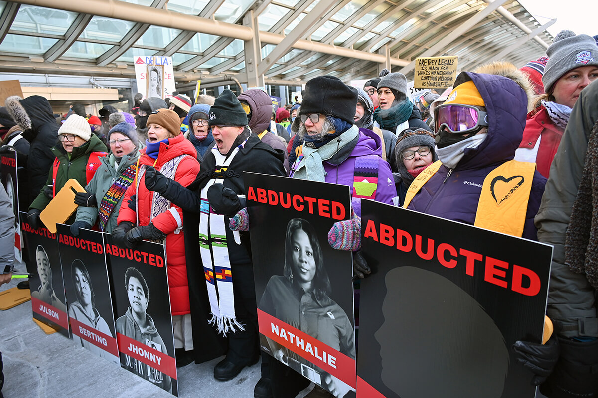 Clergy members lead a demonstration against U.S. immigration-enforcement tactics at the Minneapolis-St. Paul International Airport on Jan. 23 in St. Paul, Minn. About 100 clergy, including four United Methodists, were arrested. Photo by Jack Jenkins, Religion News Service.