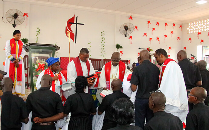 Bishop Antoine Kalema Tambwe (center, in glasses) presides over an ordination ceremony at Bethel Cascade United Methodist Church in Bangui, Central African Republic. Kalema and a delegation from the East Congo Episcopal Area visited in December for the ordination of 33 new pastors, marking a crucial step in the expansion and autonomy of the church’s mission initiative in the Central African Republic. Photo by Chadrack Tambwe Londe, UM News.