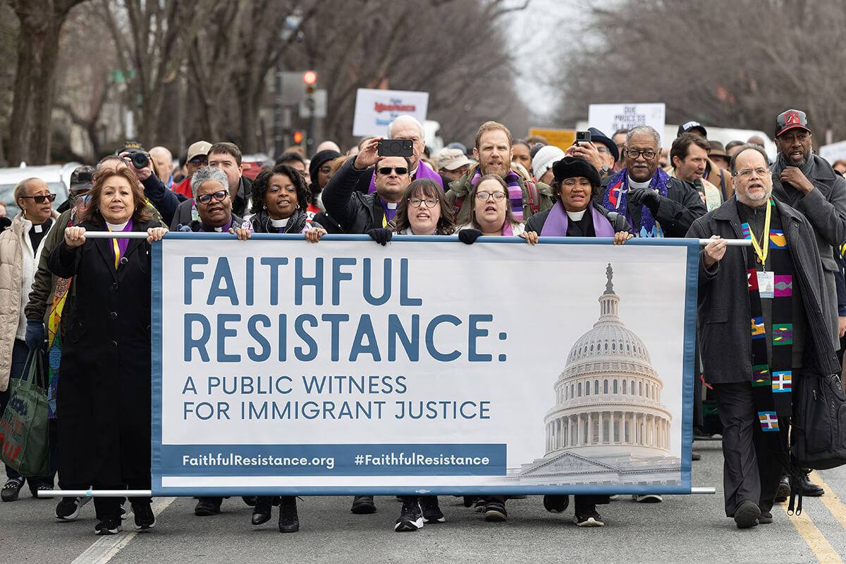 United Methodists and other faith leaders march toward the U.S. Capitol during “Faithful Resistance: A Public Witness for Immigrant Justice” in Washington. Holding the left end of the banner are United Methodist Bishops Minerva Carcaño, LaTrelle Easterling and Cynthia Moore-Koikoi. Photo by Mike DuBose, UM News.