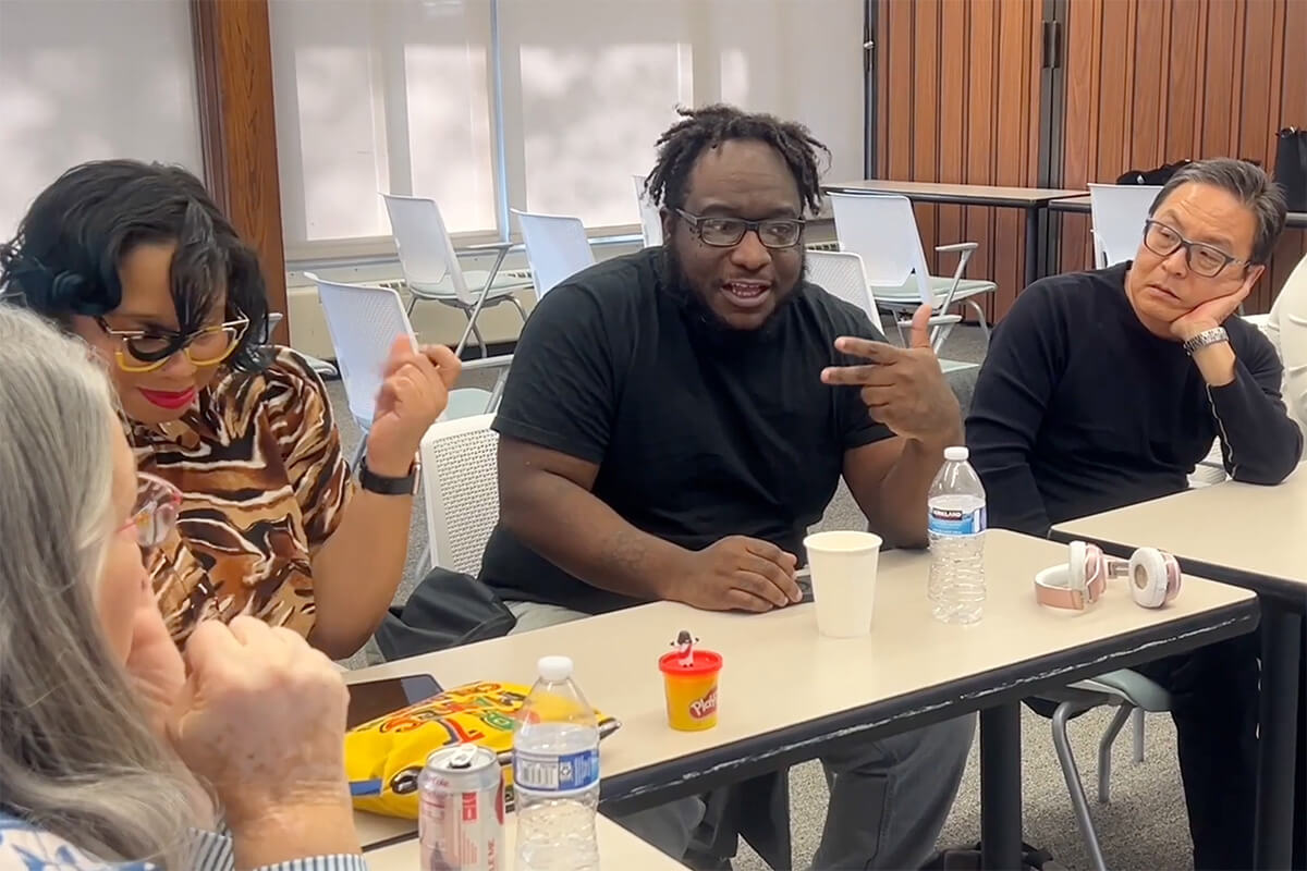 Pastor Laquaan Malachi of Brunswick United Methodist Church in Crystal speaks to the appointive council of the Minnesota Conference and to fellow members of the Wisdom Council, a panel designed to make sure historically underrepresented people have a say in the Minnesota Conference. Image from video by Lilla Marigza, UM News.