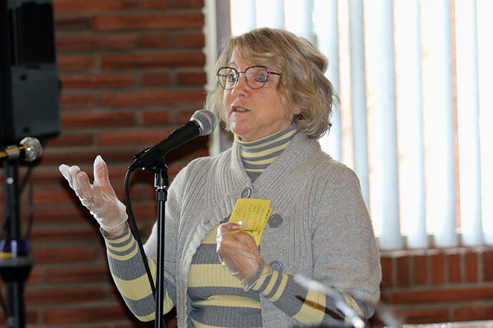 Roxy Hostrawser of Black River Falls United Methodist Church leads a devotion during the second anniversary of the church’s “Dinner Church” on March 18. Photo by the Rev. Thomas E. Kim, UM News.