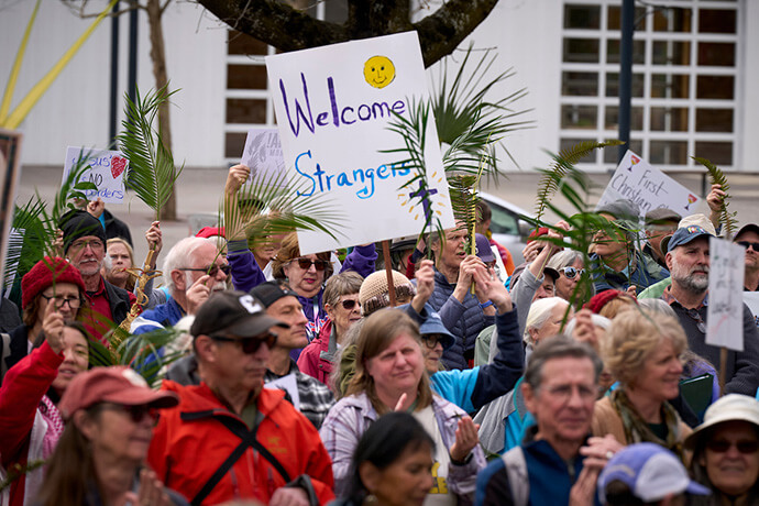 People observe Palm Sunday on March 29 in Eugene, Ore., with an ecumenical public celebration to reclaim Christianity from white nationalism. Photo by Paul Jeffrey, UM News. 