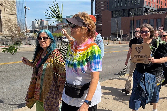Christians from many faith denominations join a Palm Sunday march through the streets of downtown Nashville, Tennessee, on March 29, 2026. The rally was one of about 30 events across 16 states. Image from video by Lilla Marigza, UM News. 
