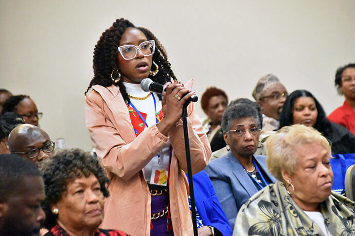 Tiffany French, a member of Black Methodists for Church Renewal’s New York Conference caucus, relates the harm that immigration enforcement actions are having on Black, largely immigrant communities in her area. Photo by John W. Coleman, UM News. 
