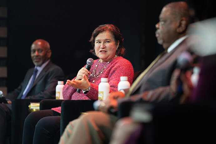 Emily Yellin (center), co-author of civil rights leader the Rev. James Lawson Jr.’s memoir, speaks during a book launch Feb. 18 at Woolworth Theatre in Nashville, Tenn. Judge John C. Lawson II, Lawson’s son, is to her right, and to her left is Dennis Dickerson, a historian from Vanderbilt University. Photo by Joe Howell, Vanderbilt University.