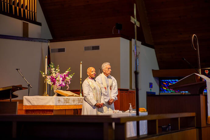 Bishops Tracy S. Malone and Ruben Saenz Jr. preside over a memorial service on April 26 during the bishops’ spring meeting in Jacksonville, Fla. Saenz is the new Council of Bishops president and co-convener of the 2026 Leadership Gathering’s design team. Malone, the council’s immediate past president, said the Oct. 20-24 event is part of the bishops’ commitment “to providing strategic, visionary, inclusive, innovative and missional leadership for the church.” Photo by Paul Gómez, United Methodist Communications.
