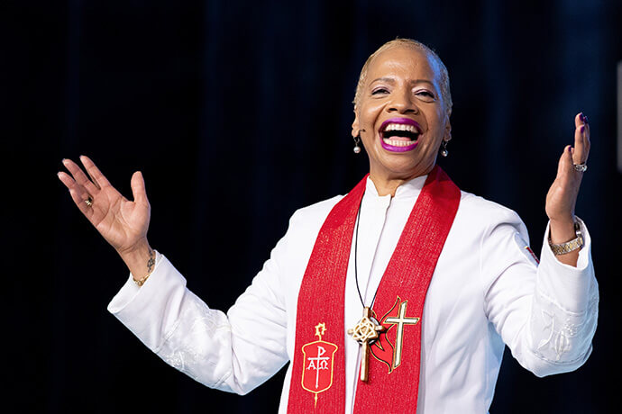 Indiana Conference Bishop Tracy S. Malone, immediate past president of the Council of Bishops, preaches during morning worship at the 2024 United Methodist General Conference in Charlotte, N.C. Malone, the first Black woman to serve as Council of Bishops president, is among the church leaders celebrating the 70th anniversary of General Conference supporting women’s full clergy rights. File photo by Mike DuBose, UM News.