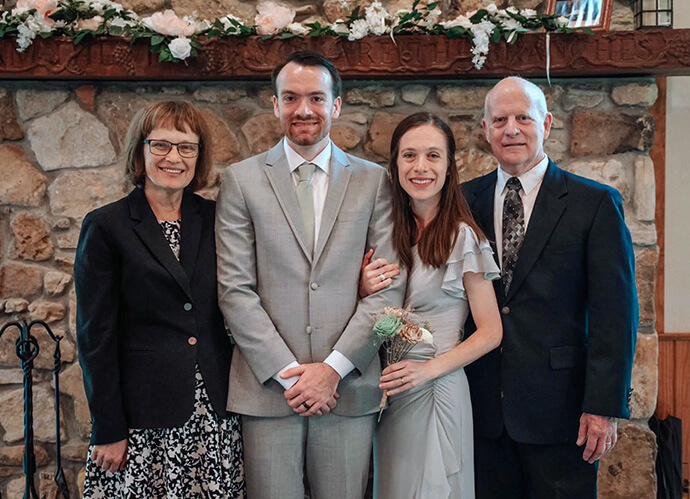 Bishop Debra Wallace-Padgett poses with her family at her son’s April 2026 wedding. From left are Wallace-Padgett, son Andrew Padgett, daughter Leanndra Thompson and husband Lee Padgett. Thompson says her mother “does a lot of juggling in order to prioritize the family.” Photo by Kaitlin Turner.