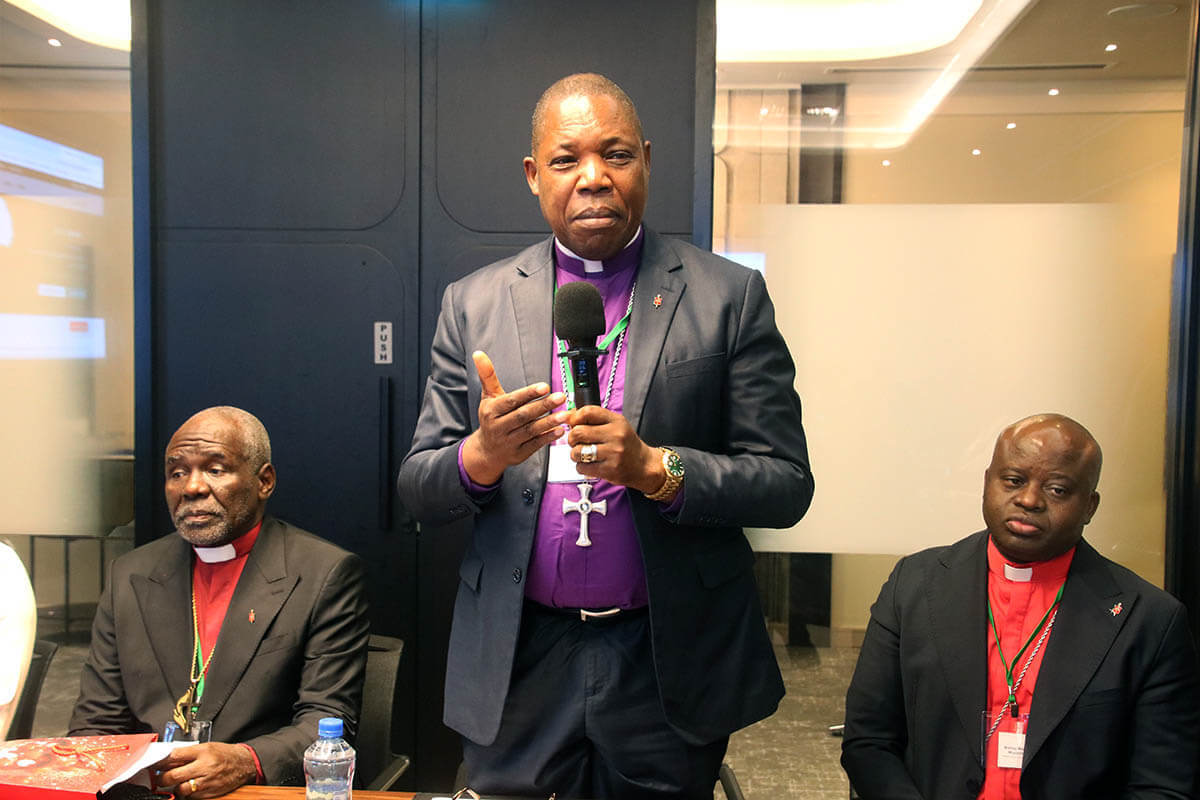 Bishop Daniel Lunge (center) of the Central Congo Episcopal Area speaks during a roundtable on communication in Dar es Salaam, Tanzania, as East Congo Bishop Antoine Kalema Tambwe (left) and North Katanga Bishop Mande Muyombo look on. The bishops emphasized that communication is an essential tool for making disciples and building peace in geographically complex and conflict-ridden areas. Photo by Chadrack Tambwe Londe, UM News.