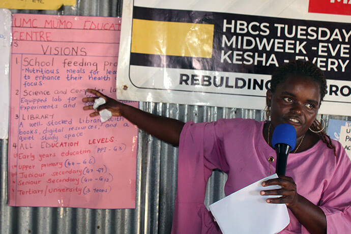 Faith Mueke, head of The United Methodist Church’s Mumo Educational Center, talks about the vision of the center to visitors from the United Methodist boards of Global Ministries and Higher Education and Ministry. Mueke was one of the Nairobi District’s first members, joining Parkview Kitengela in 2024. “Since then, The UMC has been my home, workplace and the school of my children.” Photo by Kudzai Chingwe, UM News. 