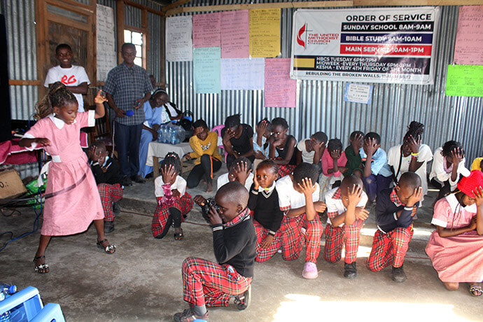 Mumo Educational Center student Yasmin Khadija demonstrates her Hula-Hoop skills as other learners look on at Parkview Kitengela United Methodist Church, where the school is housed. The school is among the outreach ministries developed by the church over the past two years. Photo by Kudzai Chingwe, UM News. 