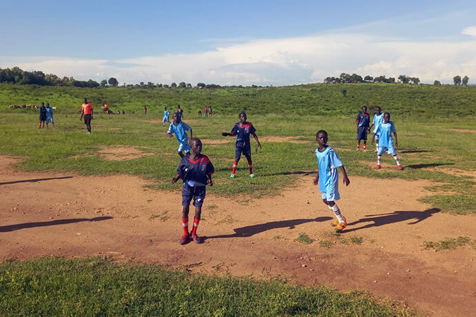 Children compete in a United Methodist Church-hosted soccer tournament at the Imvepi refugee camp in Uganda. The initiative, supported by a grant from the United Methodist Board of Global Ministries, is aimed at raising awareness about HIV and AIDS in refugee communities, especially among young people. Photo by Asiki Felix.