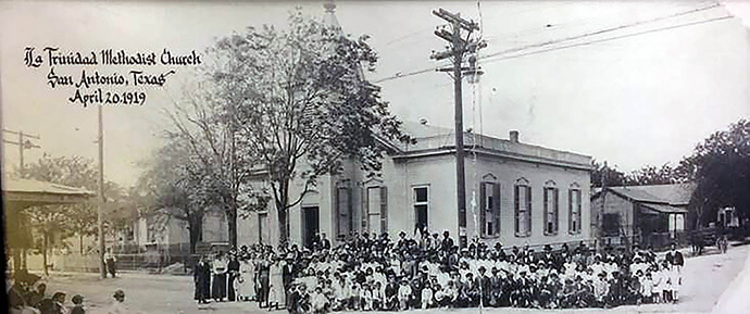 Members of La Trinidad United Methodist Church pose in front of the church building in 1919. The church, San Antonio’s oldest Hispanic Protestant congregation, is marking its 150th anniversary while renewing its commitment to serving new generations and immigrant families. File photo courtesy of La Trinidad United Methodist Church. 