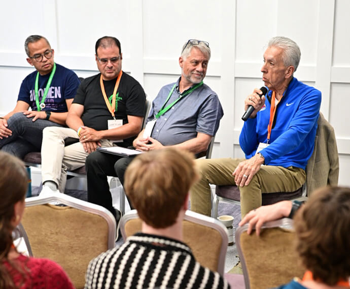 Bishop Ruben Saenz Jr. of the Horizon Texas Conference answers a question during a bishops’ roundtable at the Global Young People’s Convocation. The panel also included (from left) Bishops Carlo Rapanut of the Desert Southwest and New Mexico conferences, Bishop Héctor A. Burgos-Núñez of the Susquehanna and Upper New York conferences and Bishop Stefan E. Zürcher of the Central and Southern Europe Episcopal Area. Photo by the Rev. M. Scott Hughes, Discipleship Ministries.