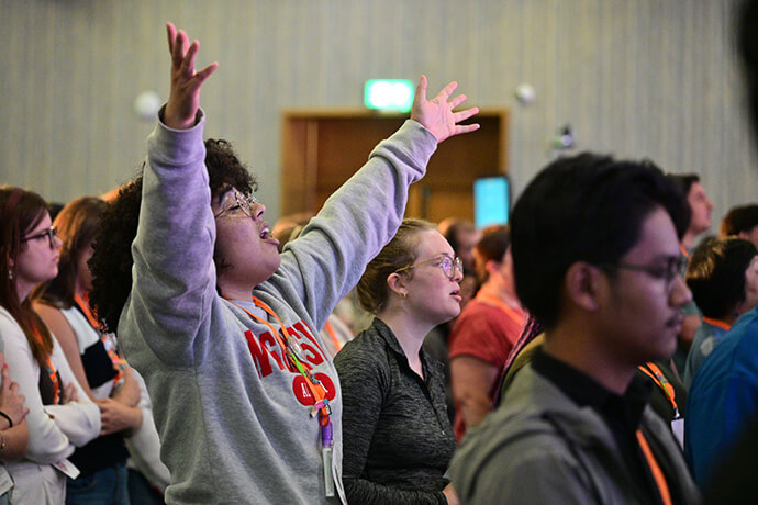 Young people participate in daily worship at the United Methodist gathering, which provided time for reflection on the importance of creating safe sanctuaries for young people. Afterward, attendees broke into groups to work on topics such as “What It Means to Be a Disciple,” “Young People in the Creation Justice Movement,” and “Building a More Equitable Church,” among others. Photo by the Rev. M. Scott Hughes, Discipleship Ministries.