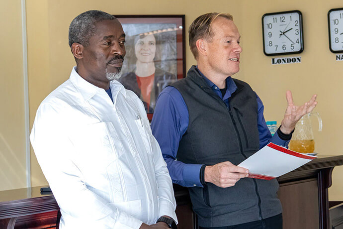 The Rev. Peter Mageto (left), vice chancellor of Africa University, and Dan Krause, top executive of United Methodist Communications, address communicators gathered for strategic communications training in June at the United Methodist-related university. Krause emphasized that Africa is home to the fastest-growing expressions of United Methodism in the world, adding that communicators are the ones called to tell the story of what God is accomplishing on the continent. Photo courtesy of Africa University. 