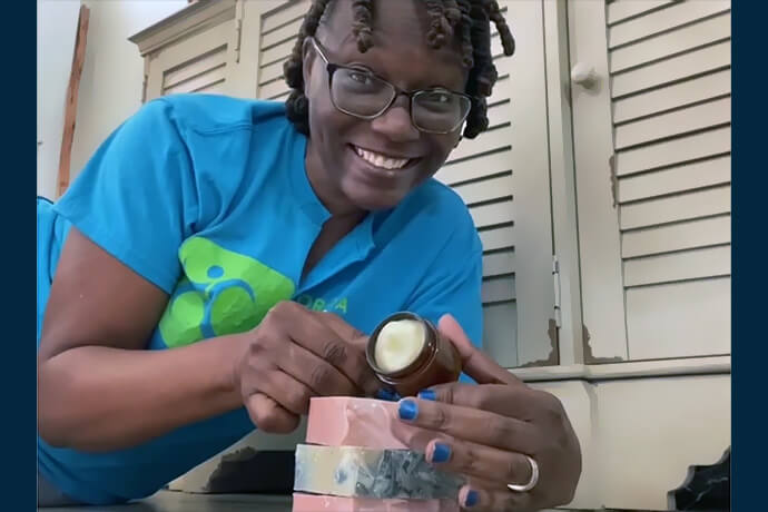 The Rev. Andrea Byer Thomas shows some of the therapeutic soaps and creams she makes to soothe skin allergies. Byer Thomas founded her vegan skincare company after making soaps for her daughter who has eczema. Photo from Instagram @Handmade_Luxuries_LLC.