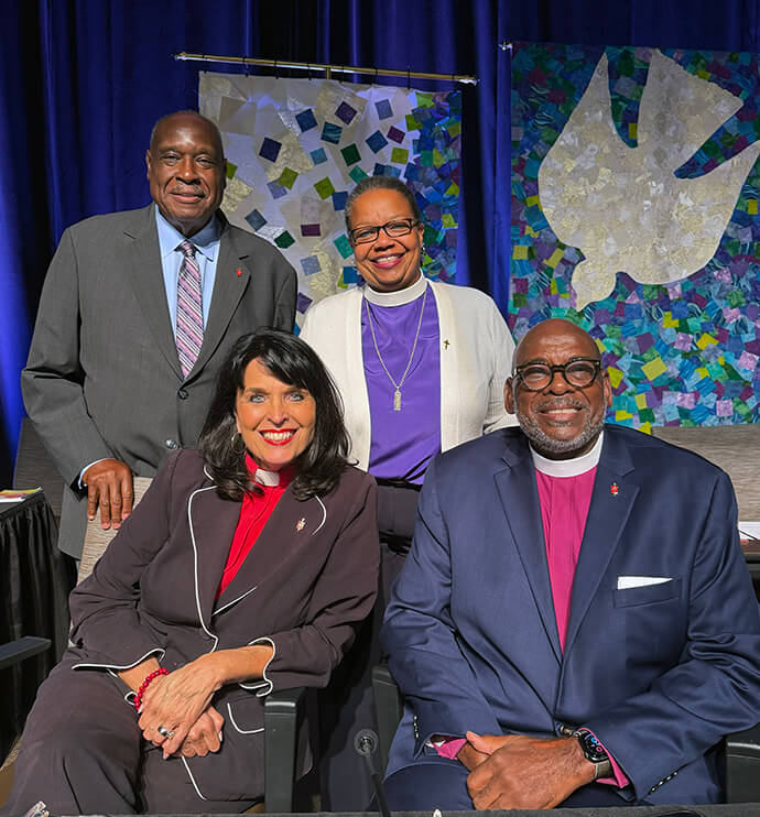 Georgia Episcopal Area Bishop Robin Dease (top right) is joined by Southeastern Jurisdictional Conference Bishops L. Jonathan Holston (right), Connie Shelton and James Swanson before the jurisdiction’s virtual conference on Aug. 11. The bishops joined a small group gathered in the North Georgia Conference office in Duluth, Georgia. Photo by Kelly Roberson, UM News. 