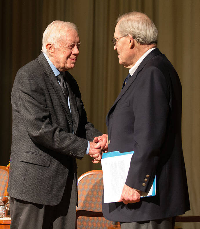 Former President Jimmy Carter (left) thanks former U.S. Ambassador to South Korea James T. Laney for his introduction at the start of the Roundtable for Peace on the Korean Peninsula at The Carter Center in Atlanta in 2018. The event, which built upon a growing momentum for peace in Korea, was hosted by the United Methodist Board of Global Ministries. File photo by Mike DuBose, UM News.