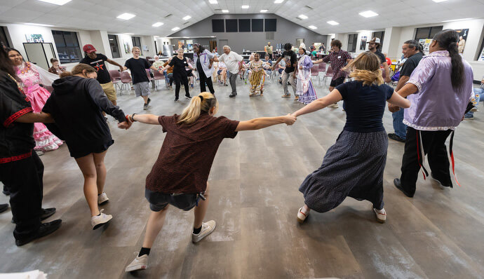 Native Moccasins Rock participants join a Choctaw dance at the Native Moccasins Rock celebration, held Aug. 14-16 in Middle Tennessee.