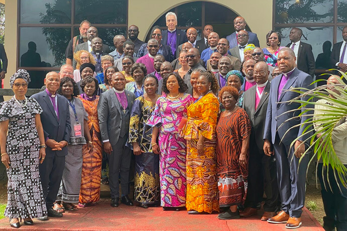African bishops, their spouses and general agency staff pose for a group photo outside the executive mansion soon after visiting the President of Liberia, His Excellency Joseph Nyuma Boakai Sr. Photo courtesy of Liberia Annual Conference Communications.