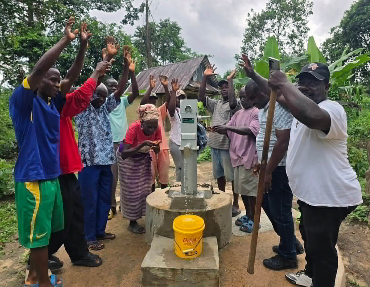 Members of Bartee Pannoh United Methodist Church and community members celebrate during the dedication of a water well in the Karquekpo community in Sinoe County, Liberia. As part of its most recent outreach, the Liberia Conference provided 25 water wells, 15 gender-sensitive toilets and poly tanks to harvest rain water in rural communities where the church is present. Photo courtesy of the United Methodist Human Rights Monitor. 