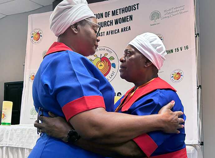 Patricia Mapani, world vice president for the World Federation of Methodist and Uniting Church Women, embraces Pamela Saungwene during the group’s national conference in Harare, Zimbabwe. Saungwene, a United Methodist from Mutare, has been a leader in fighting drug and substance abuse and assisting affected families. Photo by Eveline Chikwanah, UM News.