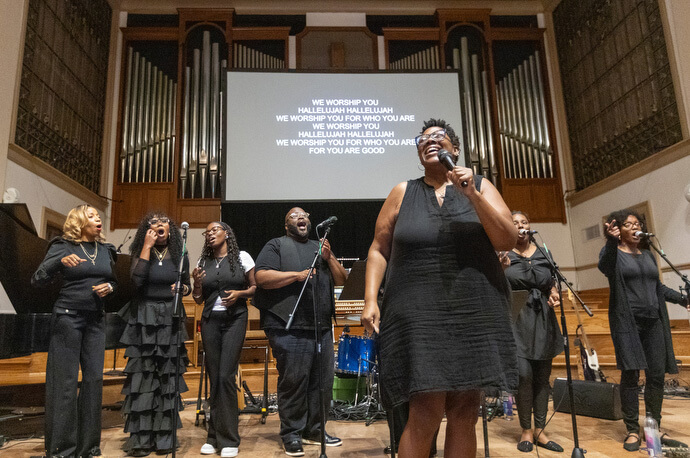 LaShanda Evans (front) leads a gospel ensemble during the Fusion 2026 Worship Music Conference.