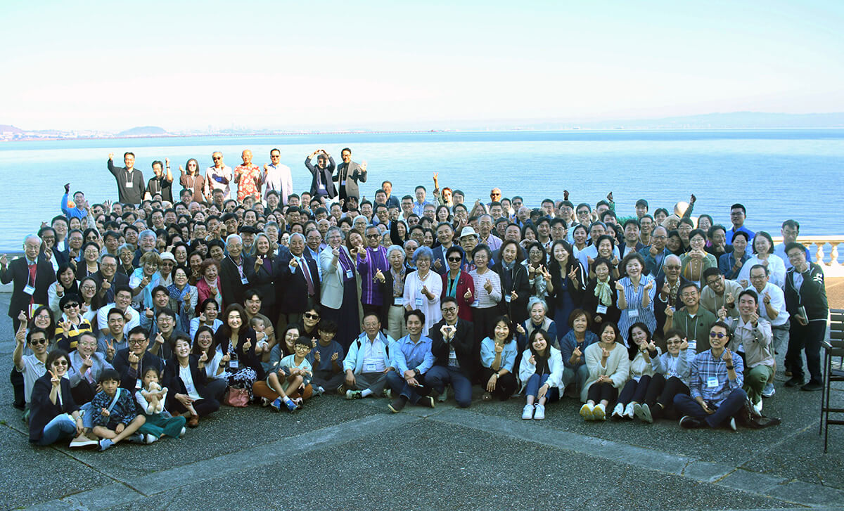 Participants in the Korean Association of The United Methodist Church’s 50th anniversary convocation pose with San Francisco Bay behind them after morning worship Oct. 6. The theme of the Oct. 5-8 gathering in Burlingame, Calif., was “Encounter, Engage, Empower.” Photo by the Rev. Eung-Sun Kim, UM News.