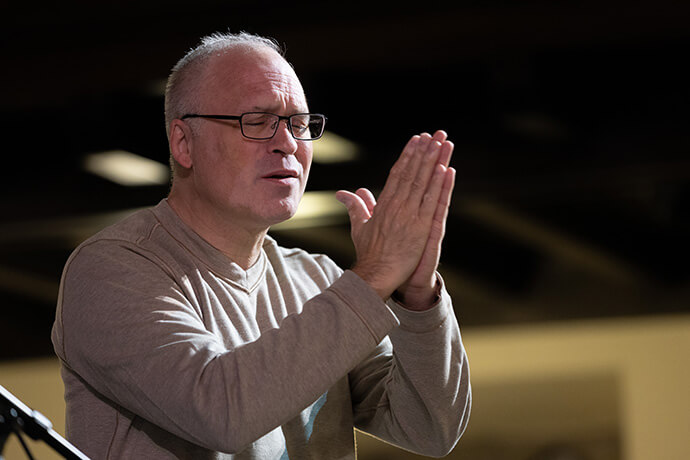 The Rev. Leo Yates offers interpretation in American Sign Language during the United Methodist Leadership Gathering on Oct. 23 at Knox United Church in Calgary, Canada. Photo by Mike DuBose, UM News.