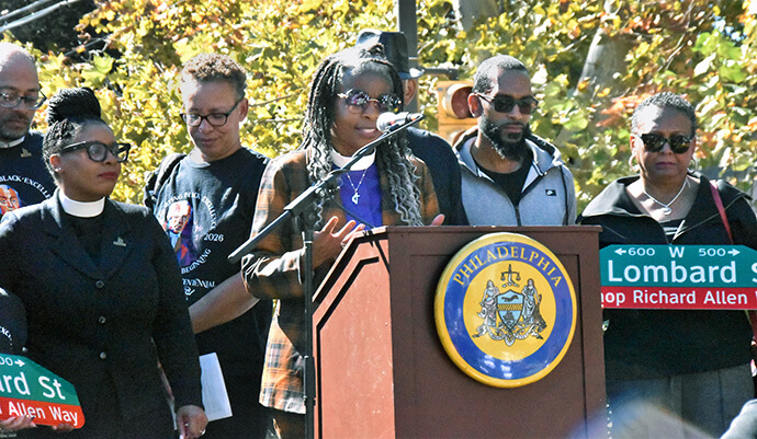 United Methodist Bishop Cynthia Moore-Koikoi offers a closing prayer at the Bishop Richard Allen Way street renaming celebration in Philadelphia. The leader of the Eastern Pennsylvania and Greater New Jersey conferences lamented the racism that forced Allen and other Black members to leave Historic St. George’s United Methodist Church in 1787. Photo by John W. Coleman, UM News. 